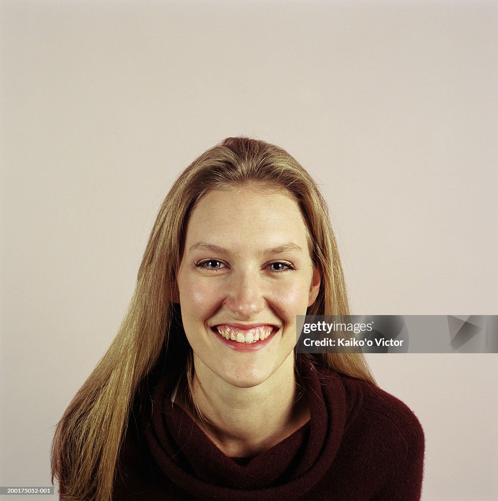 Young woman smiling, portrait