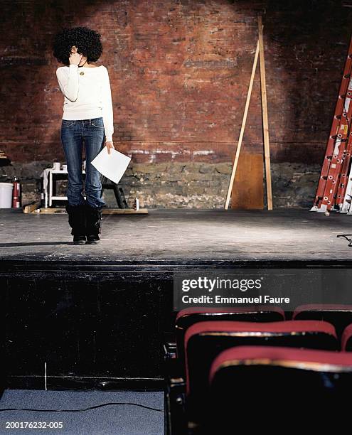 woman on stage with hand on face - audition bildbanksfoton och bilder