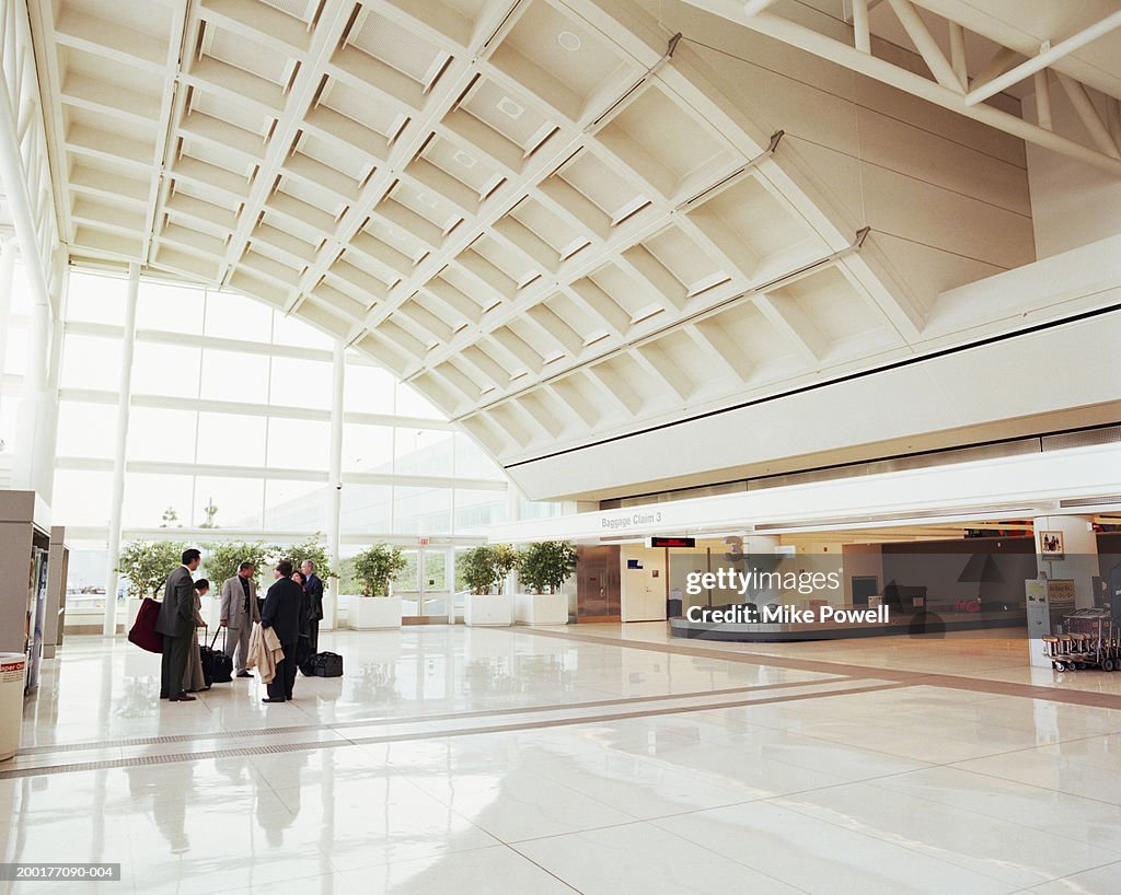 Group of business executives in airport