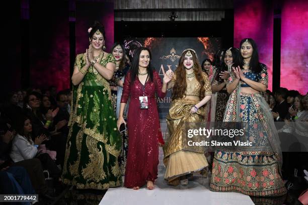 Designer walks the runway finale of AVA The Fashion Studio during hiTechMODA NYFW Season 11 at Edison Ballroom on February 10, 2024 in New York City.