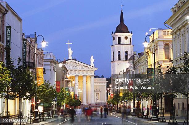 lithuania, vilnius, vilnius cathedral and bell tower by street, dusk - vilnius street stock pictures, royalty-free photos & images