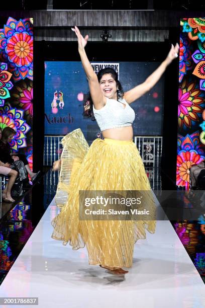 Model walks the runway wearing Dream Girl Entertainment during hiTechMODA NYFW Season 11 at Edison Ballroom on February 10, 2024 in New York City.