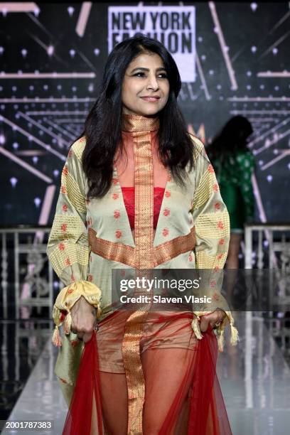 Model walks the runway wearing Dream Girl Entertainment during hiTechMODA NYFW Season 11 at Edison Ballroom on February 10, 2024 in New York City.