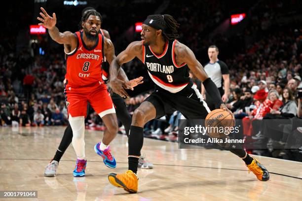 Jerami Grant of the Portland Trail Blazers dribbles against Naji Marshall of the New Orleans Pelicans during the fourth quarter of the game at the...