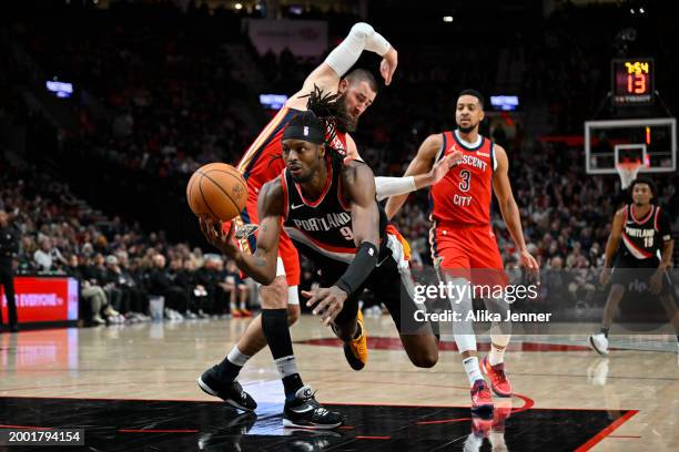 Jerami Grant of the Portland Trail Blazers in action against Jonas Valanciunas of the New Orleans Pelicans during the third quarter of the game at...