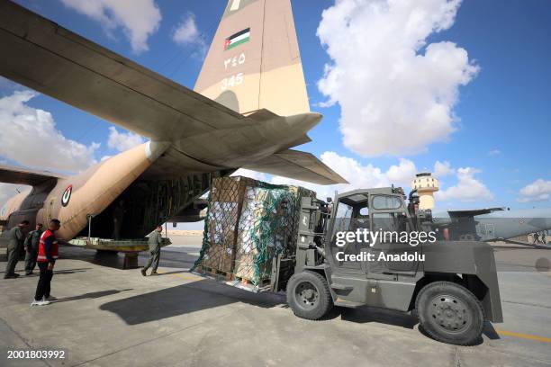 Aid supplies for Gaza are being unloaded from the plane in Al Arish Airport in Arish, Egypt on February 14, 2024. A military plane carrying medicine...