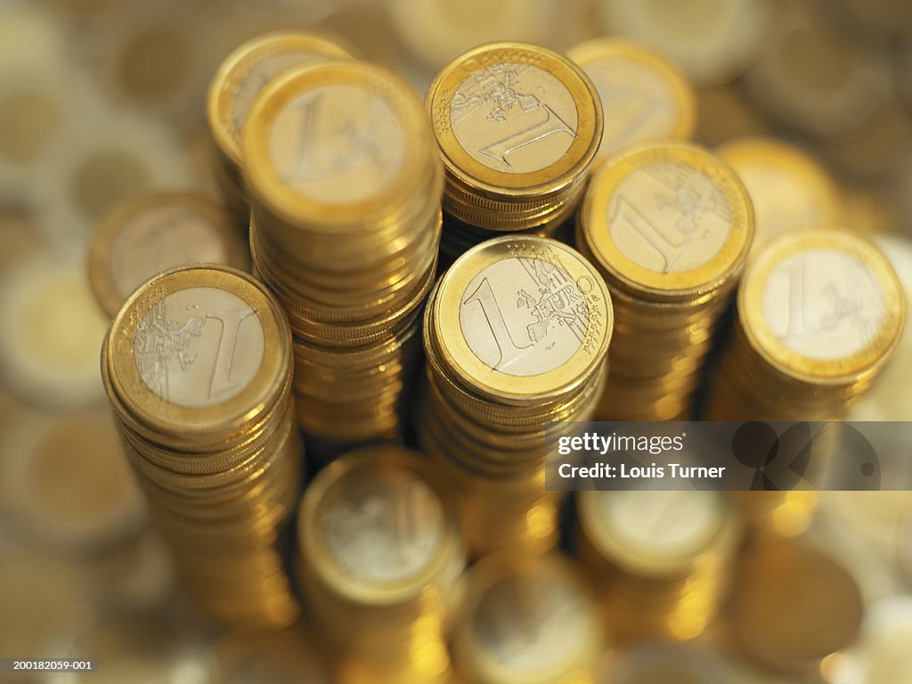 Euro Currency:  One Euro coins in stacks, close-up