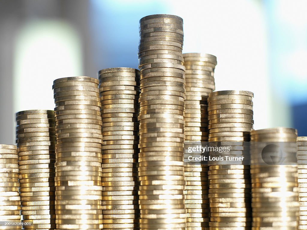 Euro Currency:  Stacked one Euro coins, close-up