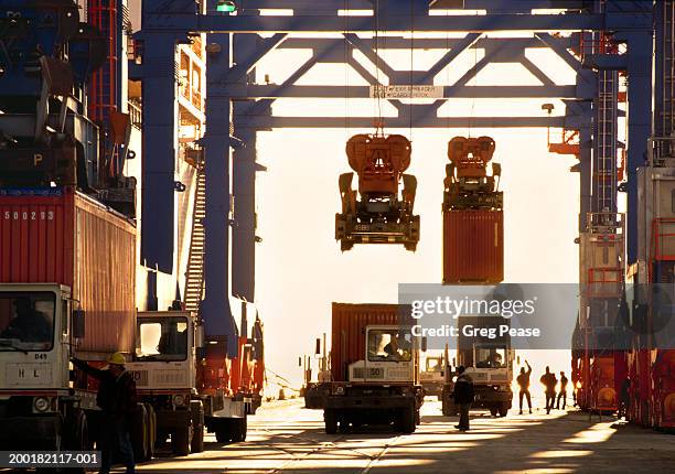 trucks and gantry in shipping terminal (digital enhancement) - 1996 stock pictures, royalty-free photos & images