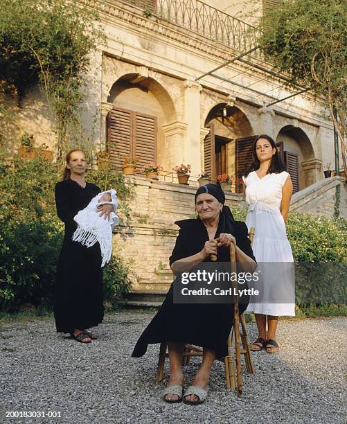 four generational female family members, outdoors, portrait - great grandmother imagens e fotografias de stock