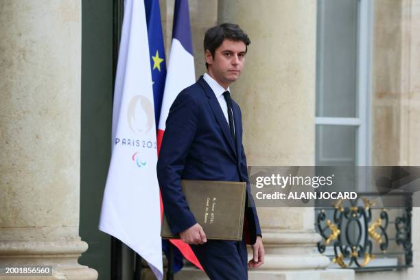 France's Prime Minister Gabriel Attal leaves the Elysee palace in Paris after the weekly Cabinet meeting on February 14, 2024.