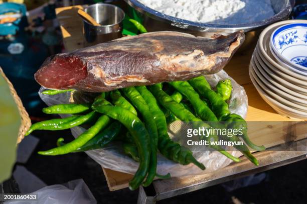 street food stall showing: beef jerky on green peppers - beef jerky stock pictures, royalty-free photos & images