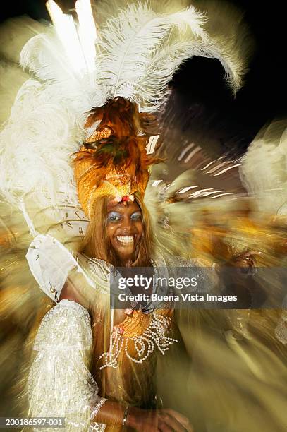 brazil, rio de janeiro, carnival, young woman dancing (blurred motion) - rio de janeiro carnival stock pictures, royalty-free photos & images