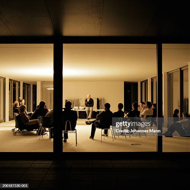 group of people in meeting, view through window - reunion de personal fotografías e imágenes de stock