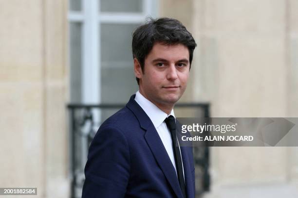 France's Prime Minister Gabriel Attal leaves the Elysee palace in Paris after the weekly Cabinet meeting on February 14, 2024.