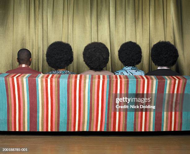 five people sitting on sofa, rear view - afro back stock pictures, royalty-free photos & images