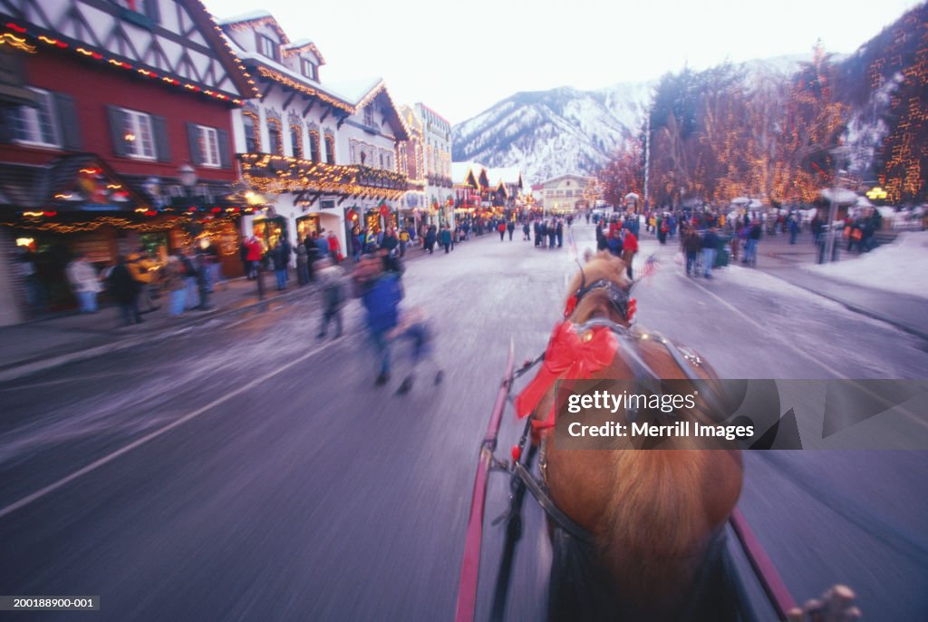 USA, Washington, Leavenworth, street scene, winter (blurred motion)