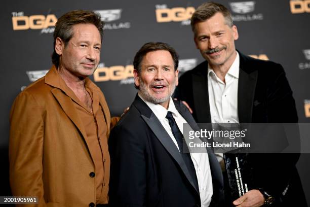 David Duchovny, David Nutter, recipient of the DGA Lifetime Achievement Award, and Nikolaj Coster-Waldau pose in the press room during the 76th...