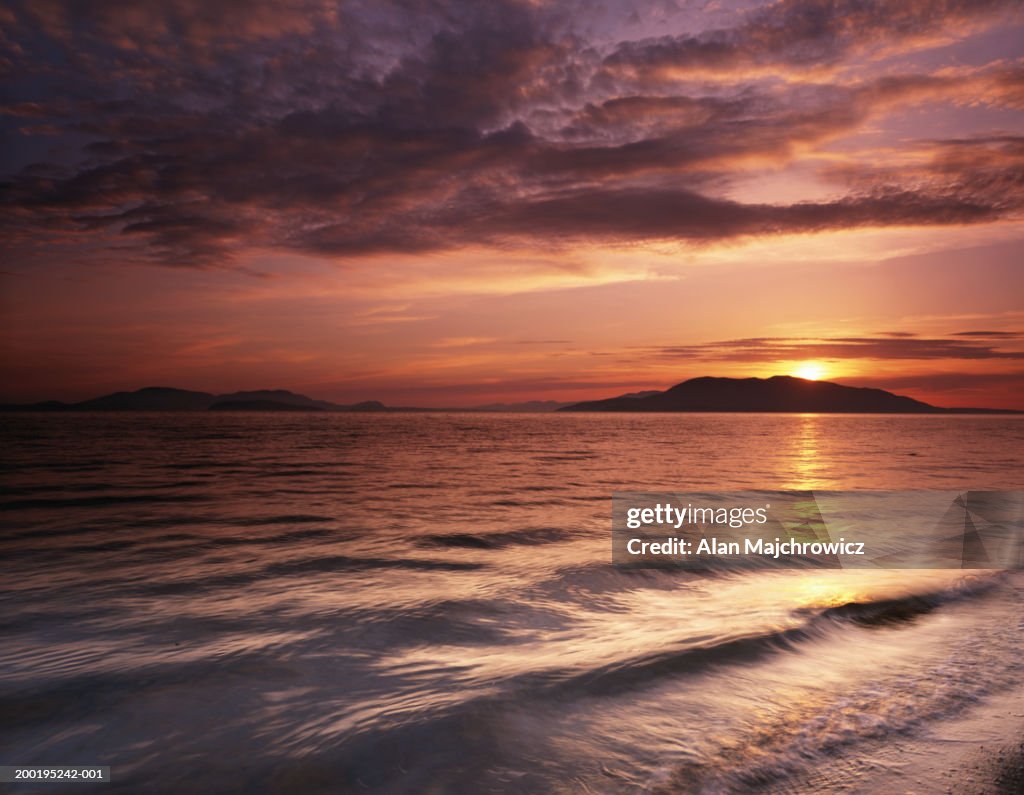 USA, Washington, Larrabee State Park, sunset over Samish Bay