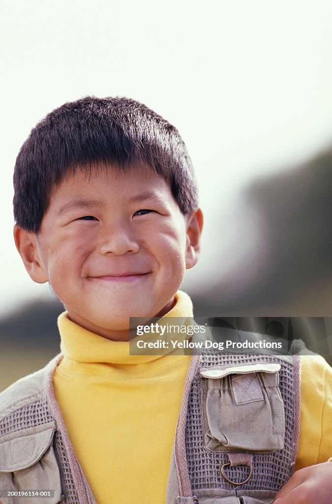 Boy (8-10) smiling, portrait