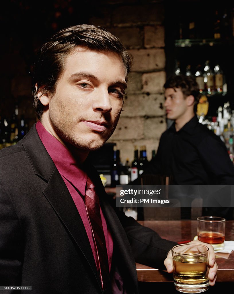 Businessman at bar, portrait