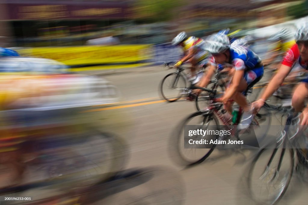 Group of cyclists participating in race (blurred motion)