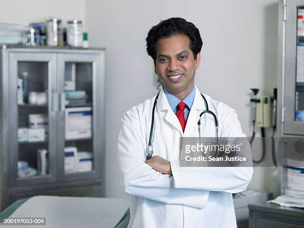 doctor in examining room, portrait - red tie stock pictures, royalty-free photos & images