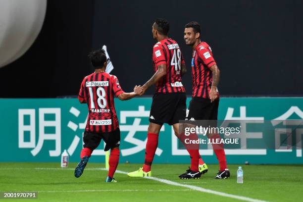 Jay Bothroyd of Consadole Sapporo celebrates Chanathip Songkrasin and Jonathan Reis after scoring the team's first goal during the J.League J1 match...