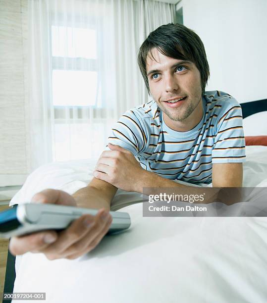 Man Using Remote 336 Man Pointing Remote Control Stock Photos, High-Res Pictures, and ...
