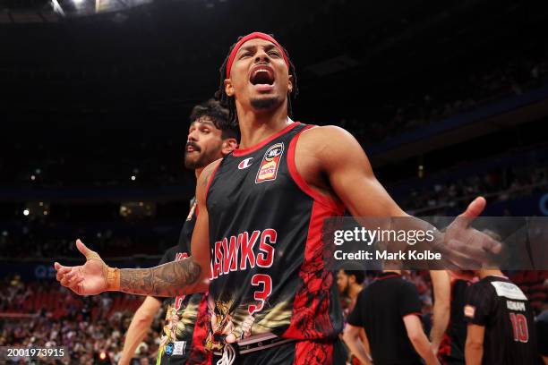 Justin Robinson of the Hawks and his team mates celebrate victory during the round 19 NBL match between Sydney Kings and Illawarra Hawks at Qudos...