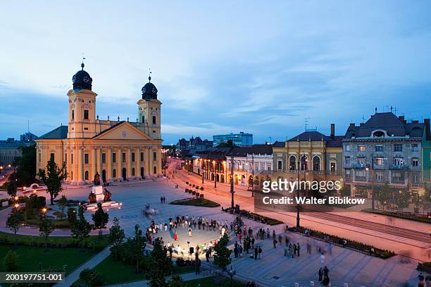 hungary, debrecen, kalvin square at dusk, elevated view - debrecen stock pictures, royalty-free photos & images