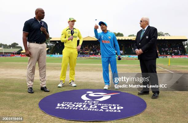 Uday Saharan of India flips the coin as Hugh Weibgen of Australia looks on ahead of the ICC U19 Men's Cricket World Cup South Africa 2024 Final...