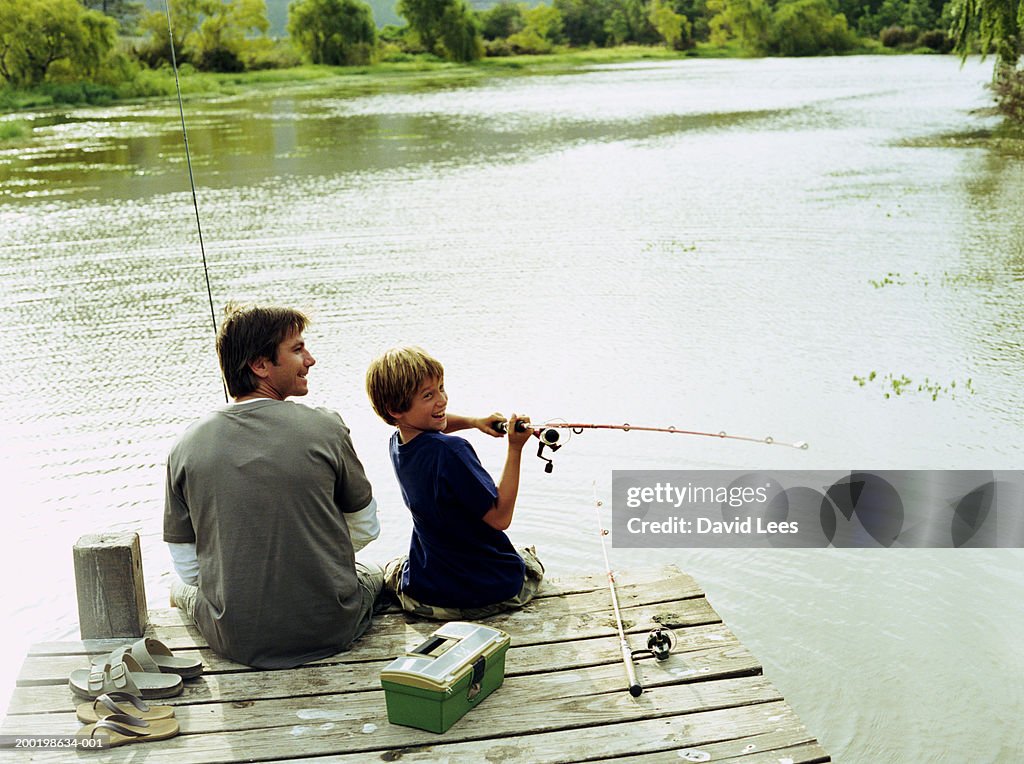 https://media.gettyimages.com/id/200198634-001/photo/father-and-son-on-jetty-boy-casting-fishing-rod-rear-view.jpg?s=1024x1024&w=gi&k=20&c=ddNUiIGRURuGoi6Iu0KaXkKCu8aNTUfqs6lMUIgbPCs=