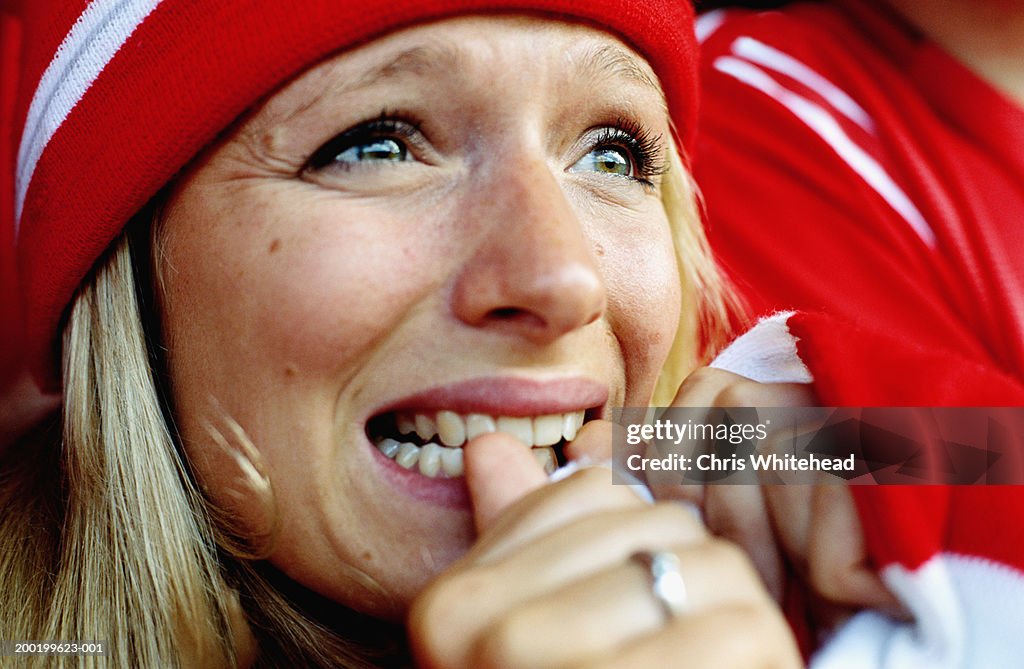Female Football Supporter At Match Biting Nails Closeup High-Res Stock  Photo - Getty Images