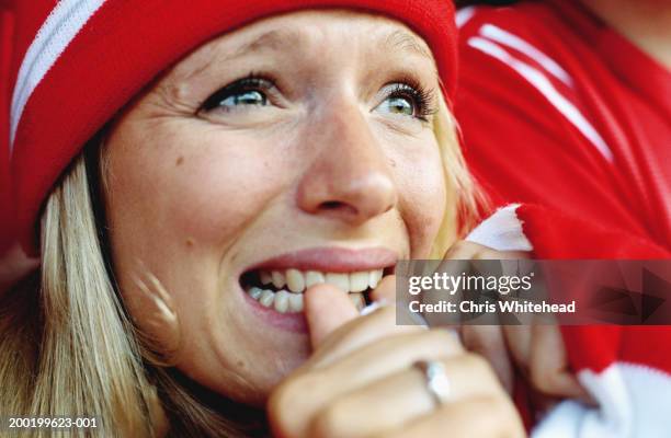 female football supporter at match, biting nails, close-up - nail biting stock pictures, royalty-free photos & images