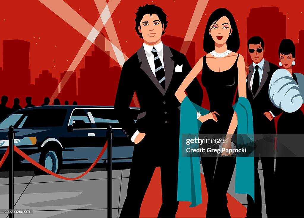 Two couples walking on red carpet, limousine in background