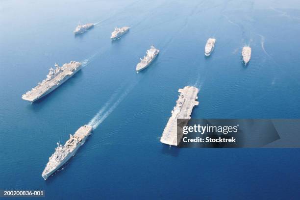 fleet of military ships at sea in arabian gulf, may 2003 - navy blue photos et images de collection