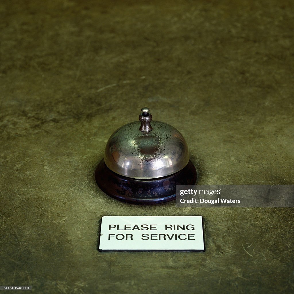 Service bell on counter, close-up