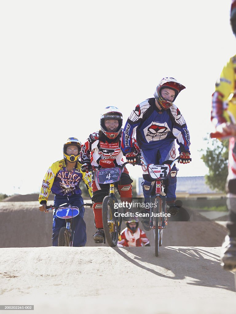 BMX cyclist in competition on track