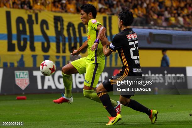 Daiki Niwa of Sanfrecce Hiroshima controls the ball against Yoshihiro Nakano of Vegalta Sendai during the J.League J1 match between Vegalta Sendai...