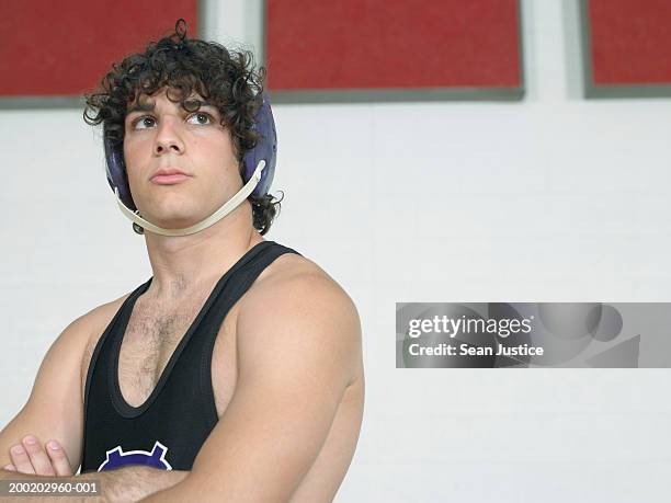 teenage boy (16-18) wrestler, looking away - wrestling men stock pictures, royalty-free photos & images