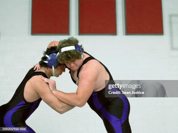 teenage boys (16-18) wrestling - boys wrestling stock pictures, royalty-free photos & images