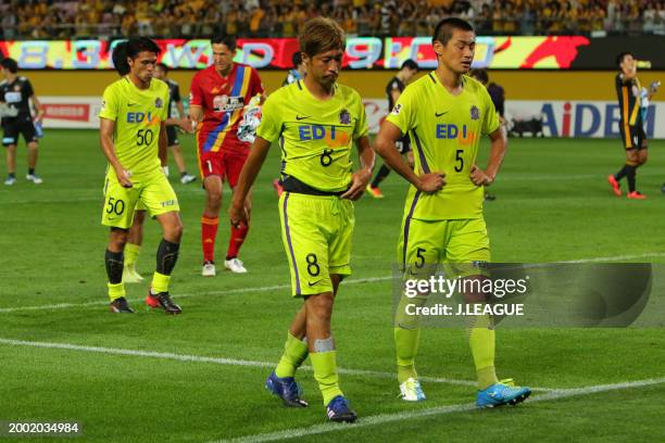 Kazuyuki Morisaki and Kazuhiko Chiba of Sanfrecce Hiroshima players look dejected after the team's 0-1 defeat in the J.League J1 match between...