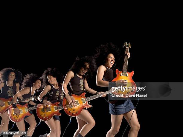 young woman playing electric guitar - série séquentielle photos et images de collection