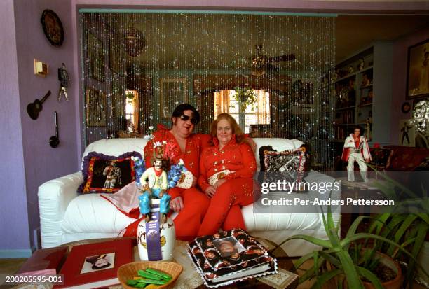 elvis fans in their house next to graceland - bead curtain stock pictures, royalty-free photos & images