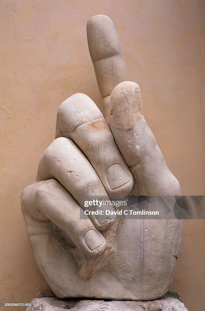 Italy, Rome, Emperor Constantine statue, close-up of hand