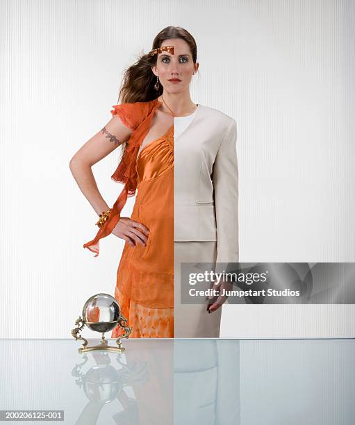 woman wearing half business attire half gypsy (digital composite) - multi colored dress photos et images de collection