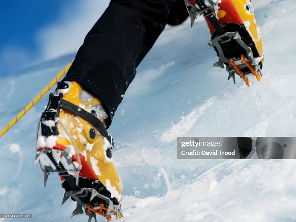 Man hiking in snow, low section