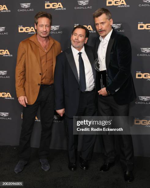 David Duchovny, David Nutter, recipient of the DGA Lifetime Achievement Award, and Nikolaj Coster-Waldau pose in the press room during the 76th...