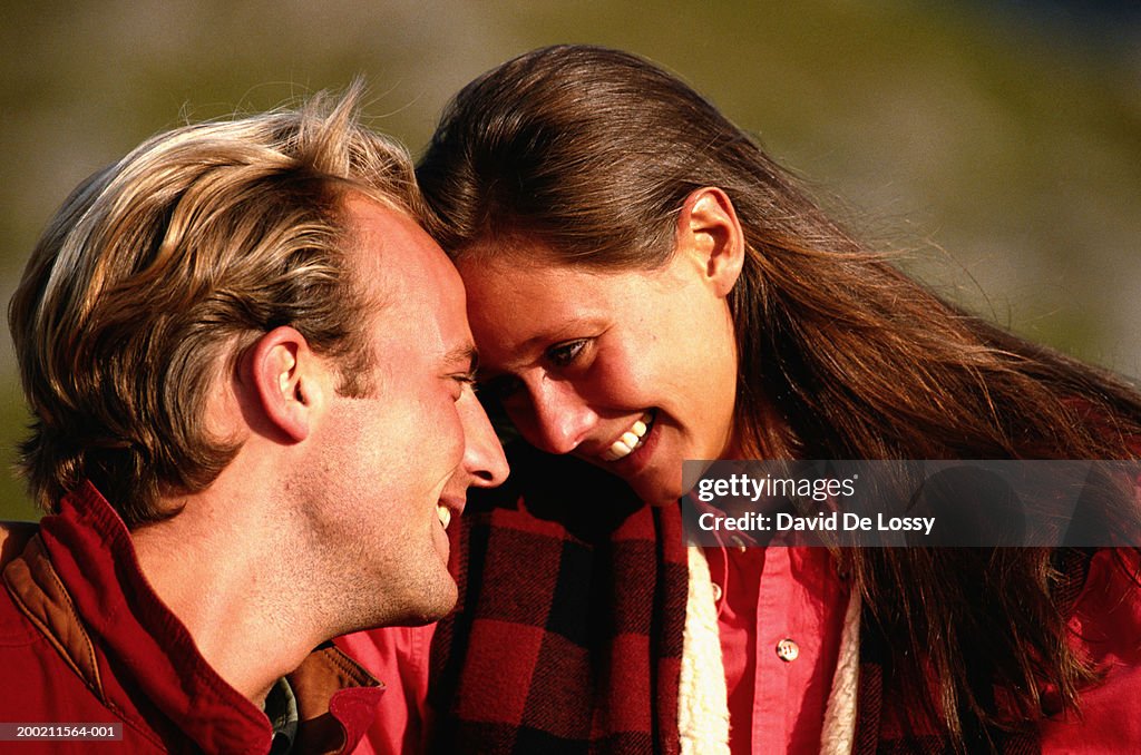 Man and woman face to face, outside